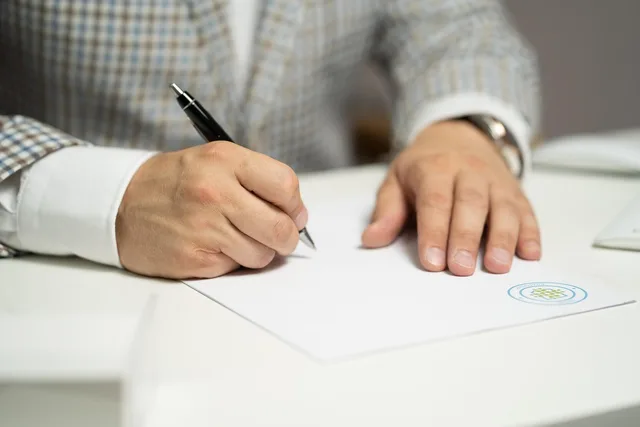 man, sign, paper, write, document, contract, signing, agreement, signature, signing document, signing contract, signing paper, sign, contract, contract, contract, contract, contract, signing, agreement, signature, signature. How Scottish public sector procurement rules shape AI marketing platforms